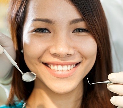 Woman receiving dental checkup