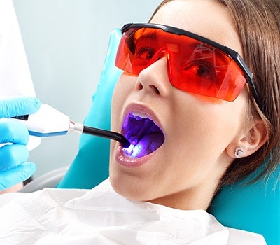 teen girl getting dental sealants
