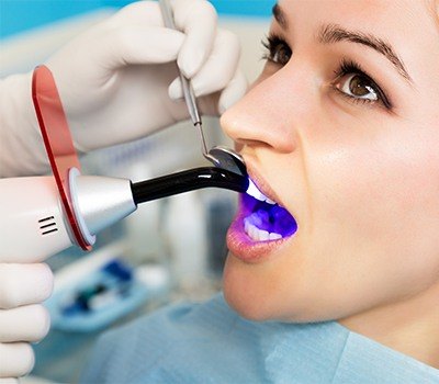 woman getting cosmetic dental bonding