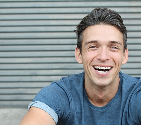 patient smiling after cosmetic dentistry 