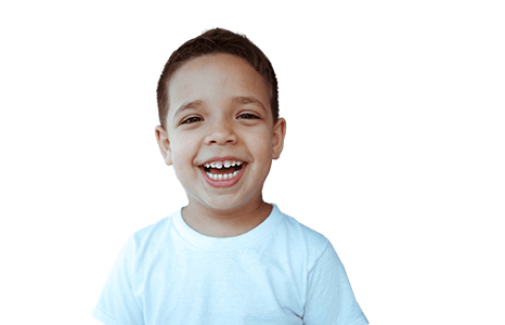 Young boy laughing after children's dentistry