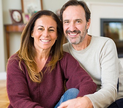 Man and woman with healthy smile thanks to the dentist near Glenn Dale