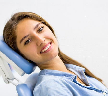 Happy patient at appointment for laser dentistry in Bowie