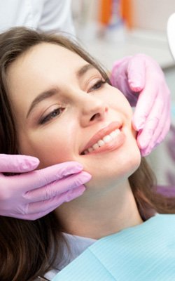 young woman visiting cosmetic dentist