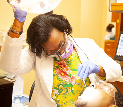 man getting oral cancer screenings check