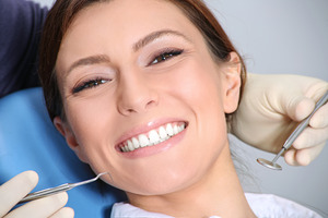 Smiling woman in a dental chair