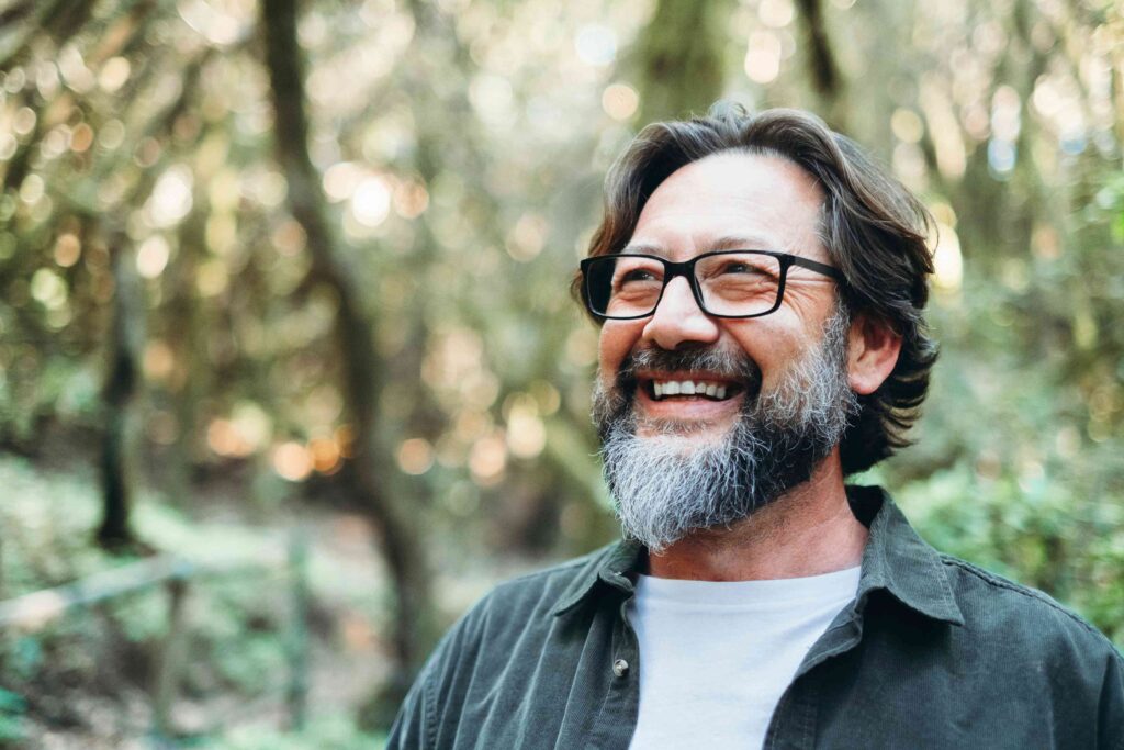 Man smiling outside